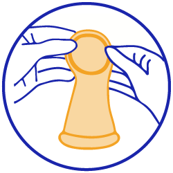 A pair of hands putting lubricant on the interring of an internal condom.