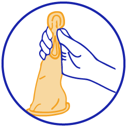 A hand pinching the inter ring of an internal condom.